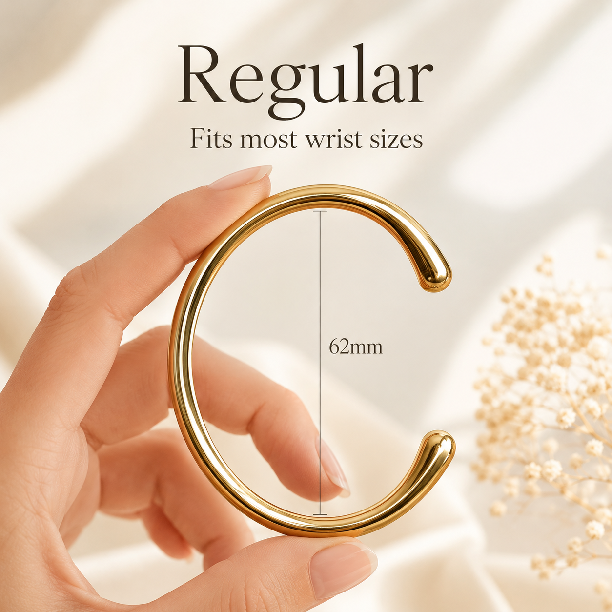 Hand holding bracelet with sizing reference